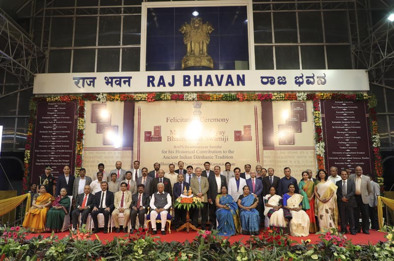 The Governor of Karnataka, His Excellency Vajubhai Vala, together with the university vice-chancellors and representatives